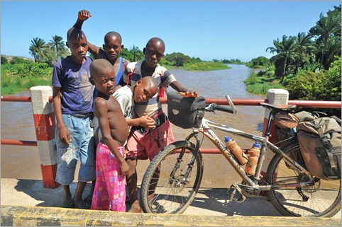 3b. Kids check out my bike, 40km south Sumbe